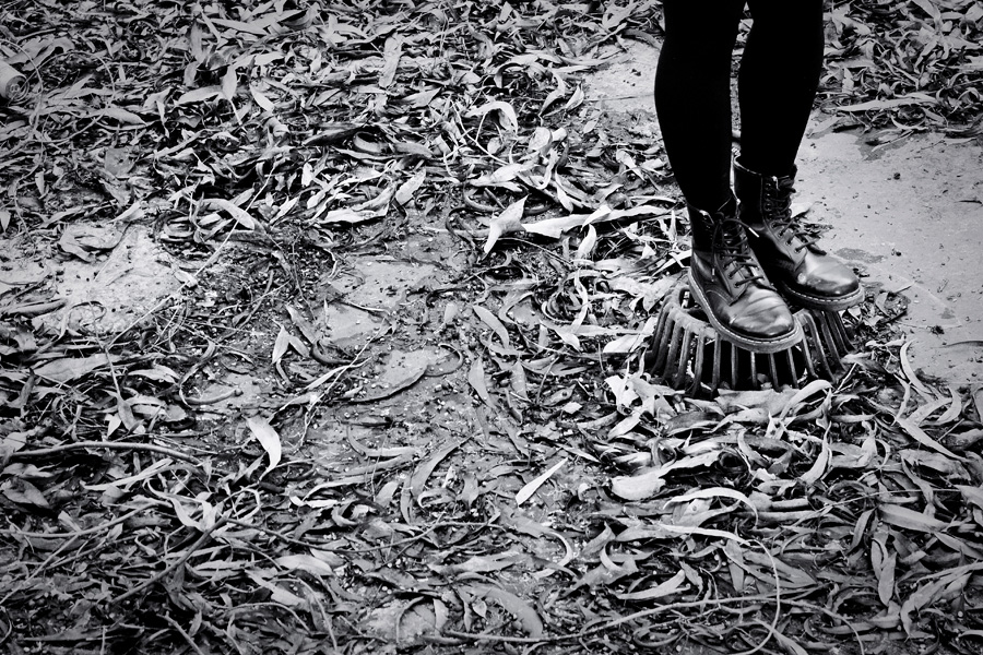 Jac's Dr. Martens in a sea of autumn leaves.