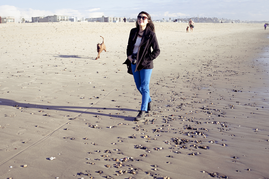 Deb walking along the seashore of Marina Del Rey beach.