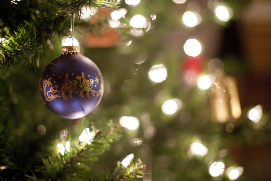 Close-up of a bauble decorating a christmas tree.