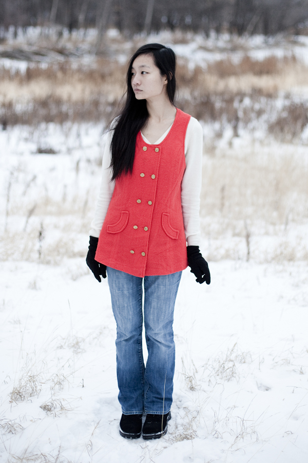 Outfit photo: Thrifted red vest, Uniqlo cream cashmere sweater, borrowed Gap jeans.