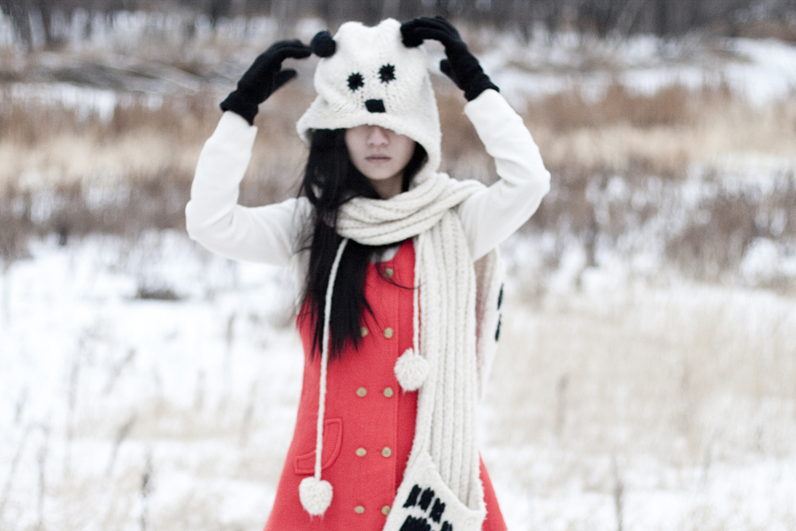 Outfit photo: Thrifted red vest, Uniqlo cream cashmere sweater, gifted River Island panda hooded scarf.