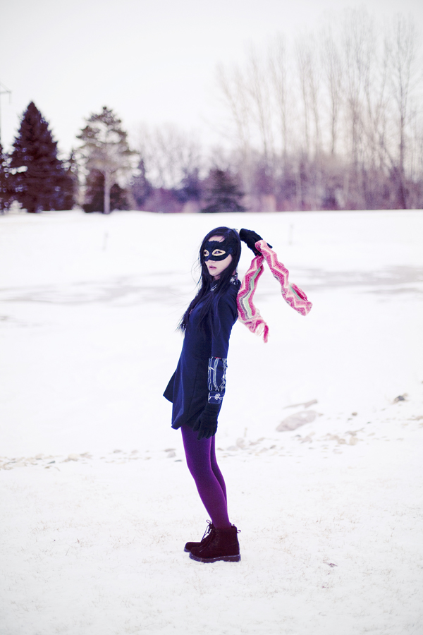 Photoshoot in the snow. Outfit details: Forever21 black pleated dress, Dollhouse grey jacket, Hue maroon red ribbed tights, Fox striped zigzag scarf, thrifted vintage floral black shirt, Fila black men's shoes.