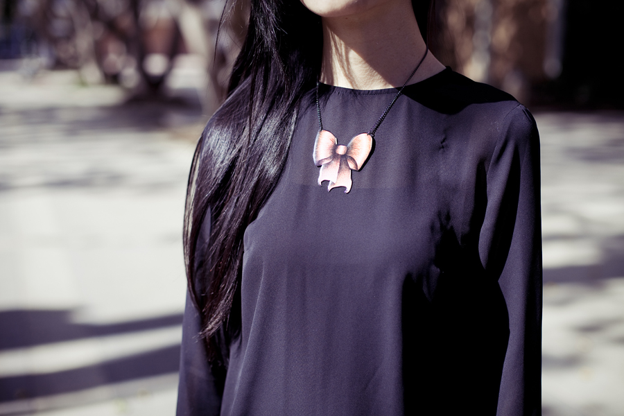 Outfit details: H&M black chiffon dress, La Marelle NÅ“ud pink bowtie metal necklace.