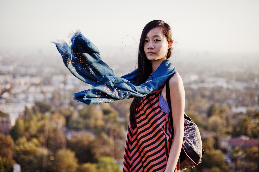 Ren at Runyon Canyon Park in Hollywood, Los Angeles. Outfit details: Uniqlo blue patterned bra-top camisole, Forever21 striped satin orange and black dress, gold studded blue scarf, Forever21 knee-high light grey socks, Fila black men's boots, T-shirt & Jeans geometric tribal printed backpack.