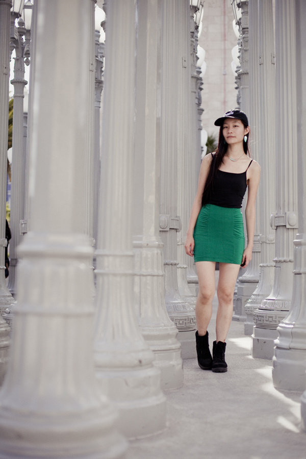 OOTD at LACMA wearing: Uniqlo black bratop camisole, Forever21 green bandage skirt, Fila black men's boots, Harry Potter Muggle cap, Forever21 mint turquoise necklace and leaf earrings.