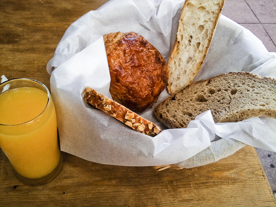 Nam's bread basket comes with orange juice and hot chocolate at Le Pain Quotidien at Westwood, Los Angeles.