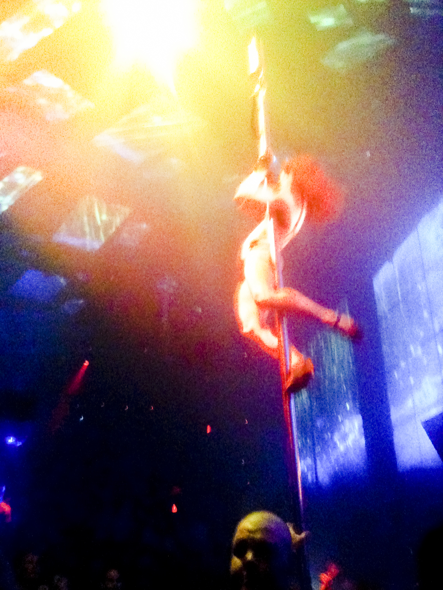 Cirque Du Soleil acrobats above the dancefloor of Light nightclub in Las Vegas.