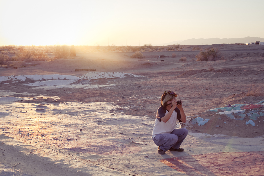 Shamis photographing Salvation Mountain as the sun set.