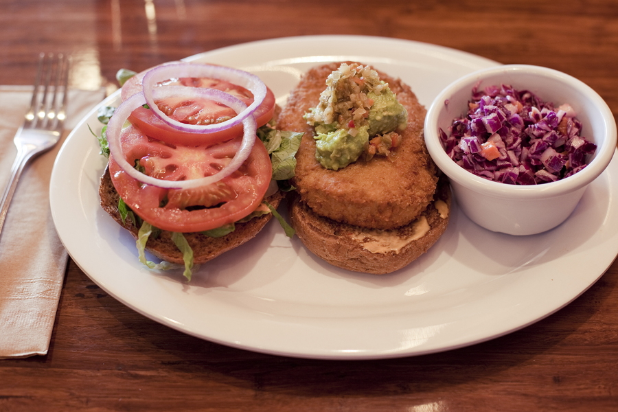 Santa Fe Chicken Sandwich with a side of coleslaw at Veggie Grill in Westwood, Los Angeles.