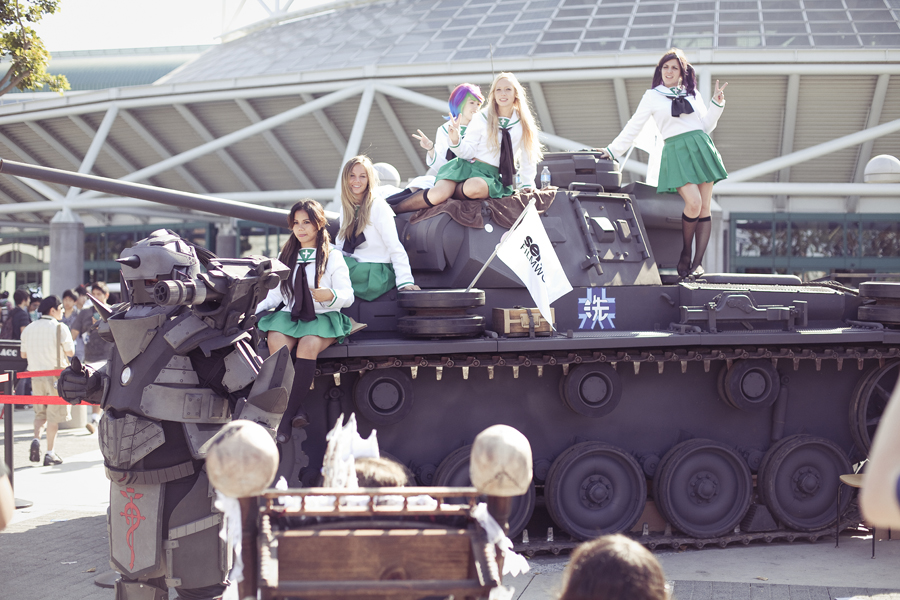 Cosplayers on a tank at Anime Expo 2013.