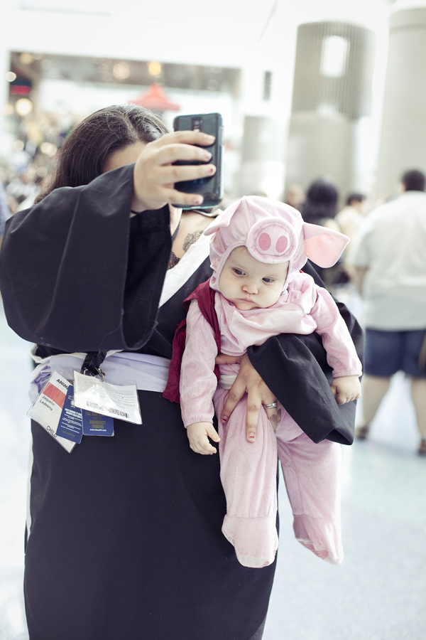 Cute baby in a pig costume at Anime Expo 2013.
