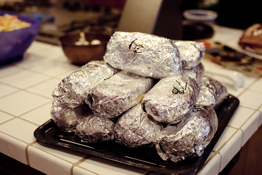 A dozen Chipotle burritos at the REMAP party at Jeff's house.