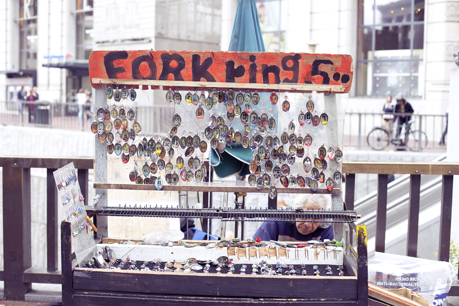 Roadside stall displaying Fork Rings on Union Street in San Francisco.