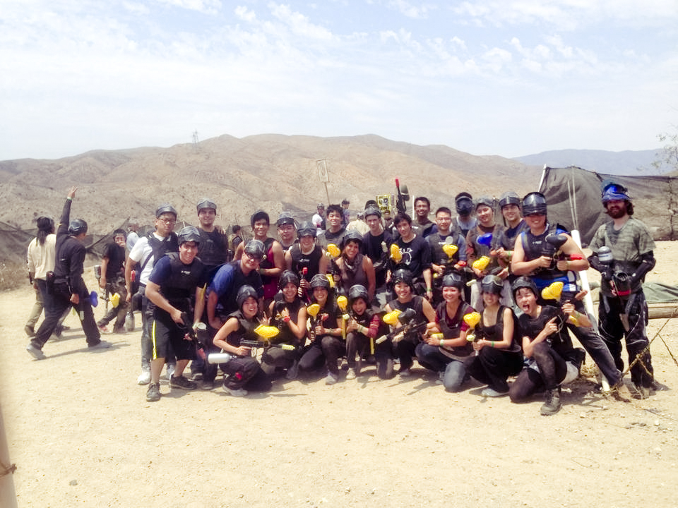 Group photo of friends for two teams: Red vs. Yellow paintball at Paintball USA at Santa Clarita, California.