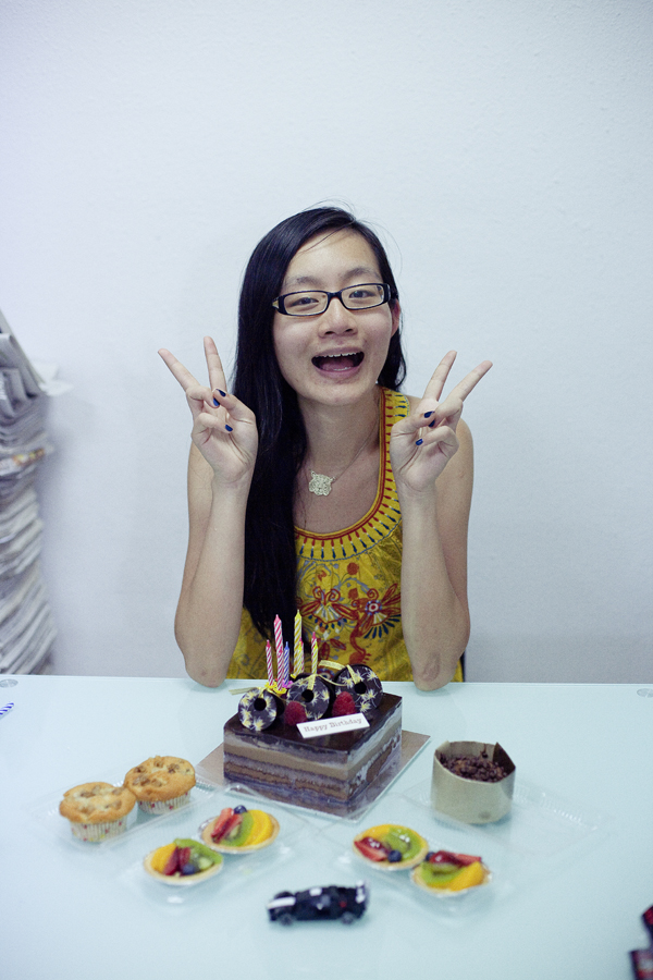 Ren and cake and assortment at her 27th birthday celebration.