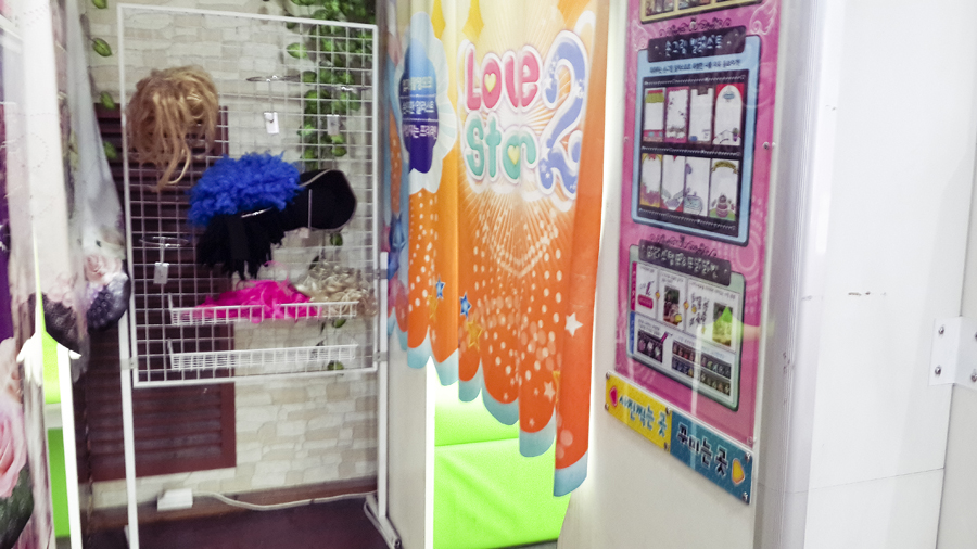 Props and wigs for purikura booths in Busan, South Korea.
