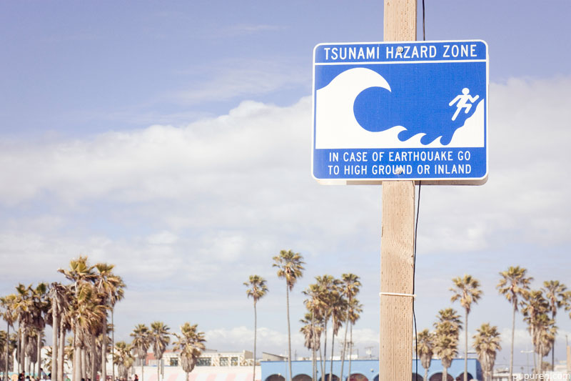 Tsunami hazard sign at Venice beach, Los Angeles.
