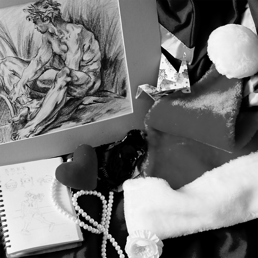 Christmas 2013: Study of FranÃ§ois Boucher's drawing, santa hat, and knick knacks on graduation gown.