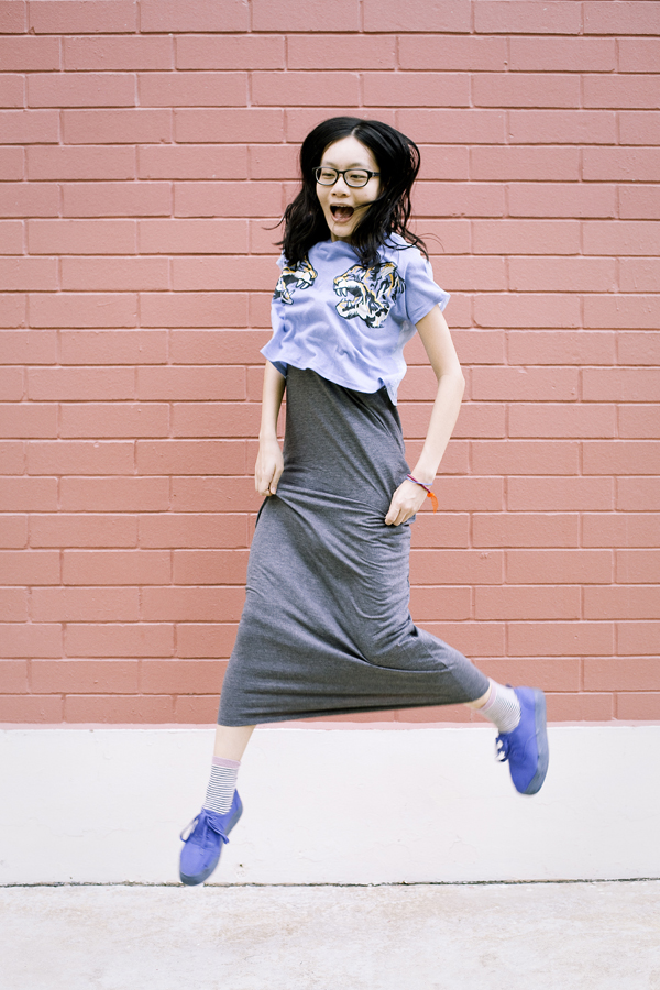 Levitating shot wearing Forever 21 grey maxi dress, NA NI tiger crop top, Accessorize striped fox socks, H&M blue platform shoes.