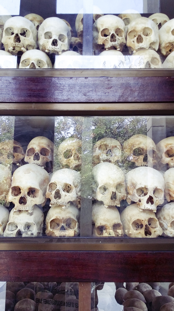 Skulls of the victims at the stupa at Choeung Ek Killing Fields in Phnom Penh, Cambodia.