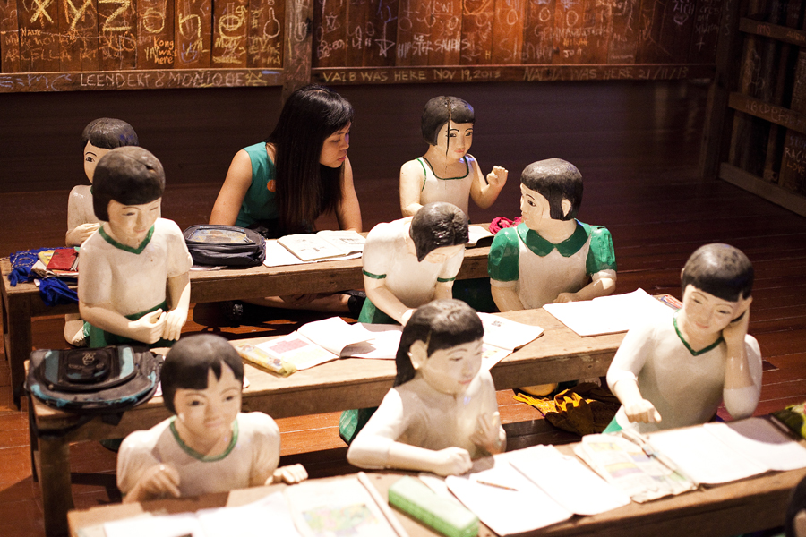 Ruru at The Sick Classroom by Nge Lay. 27 wooden sculptures and classroom furniture.