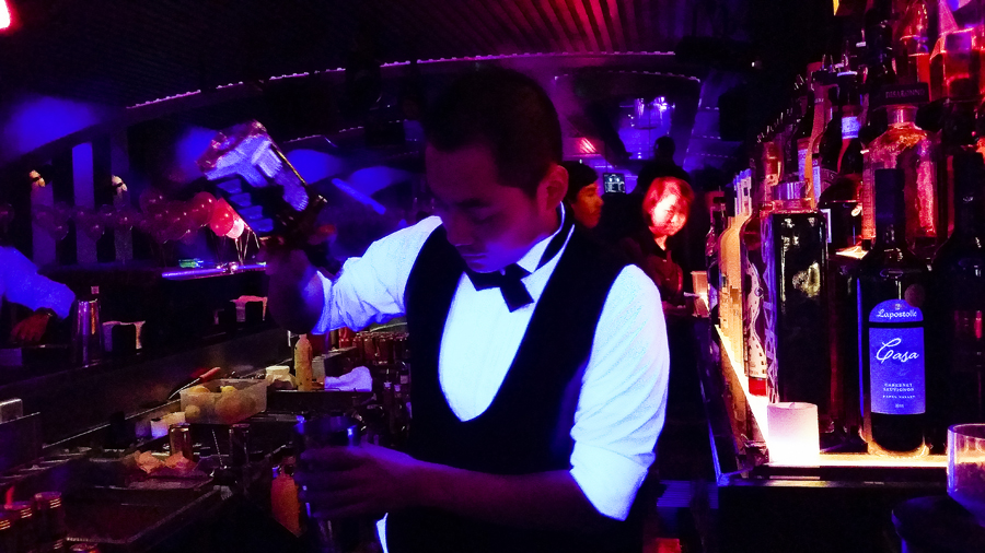 Bartenders at Cirque le Soir nightclub in Shanghai.