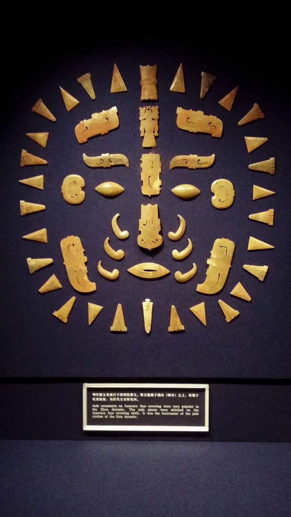 Ornaments on a funerary face covering from the late western Zhou dynasty (first half of 9th century - 771 BC) at the Shanghai Museum.