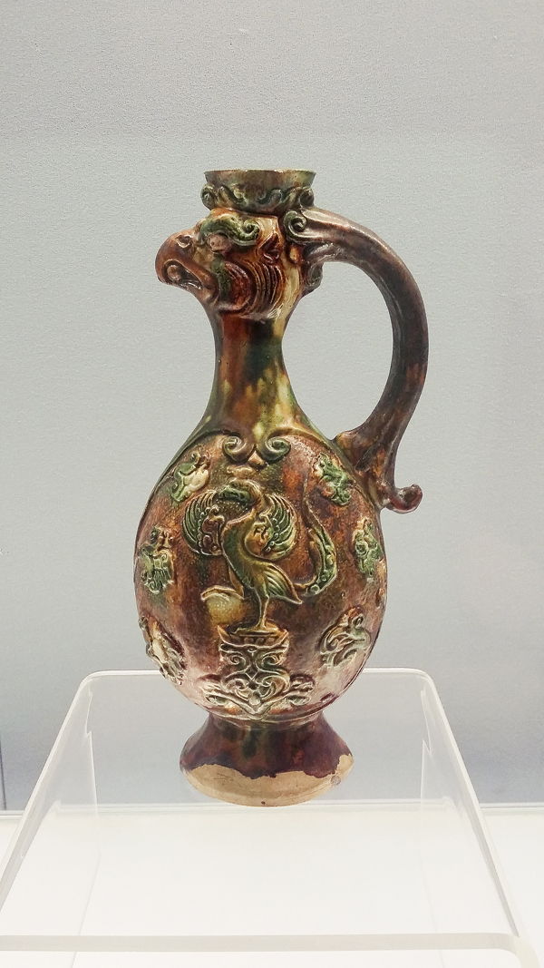 Polychrome glazed pottery ewer with a phoenix head from the Tang Dynasty (618-907 AD) at the Shanghai Museum.