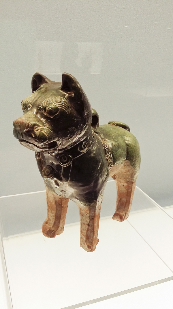 Green glazed pottery dog from the eastern Han Dynasty (25-220 AD) at the Shanghai Museum.