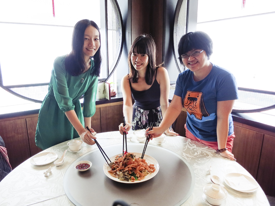 Ren, Ade, and Puey with lohei at Tian Fu Tea Room by Si Chuan Dou Hua in Singapore.