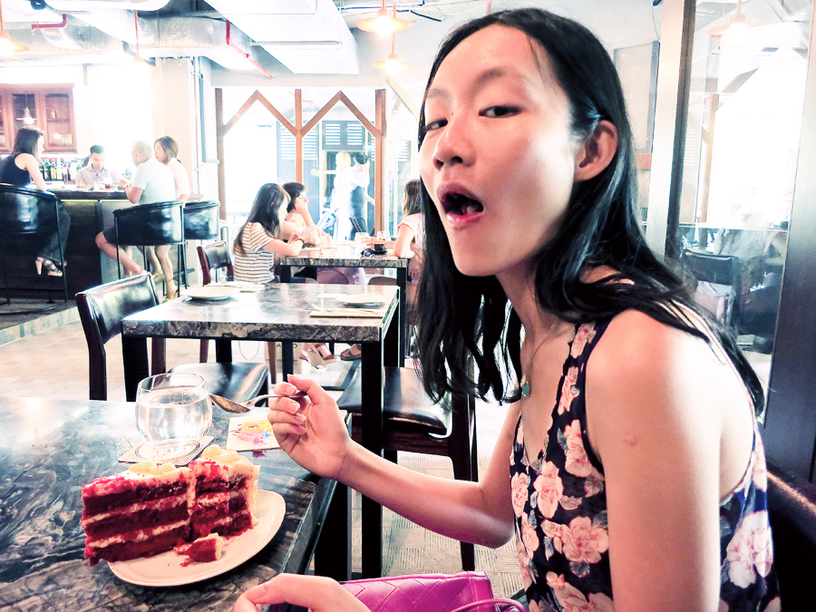 Ren eating a Red Velvet Cake from Cloud9 at boCHINche.