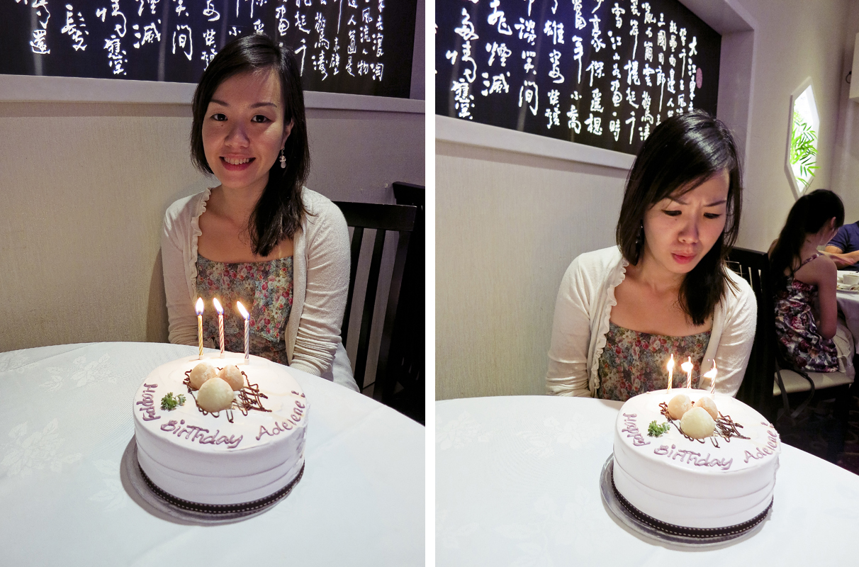 Ade trying to blow out trick candles on her birthday cake from Pine Garden's Cake at East Ocean Teochew Restaurant.