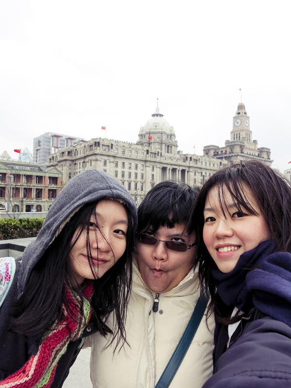 Ren, Puey, and Ade at the Bund, Shanghai. Photo by Ade.