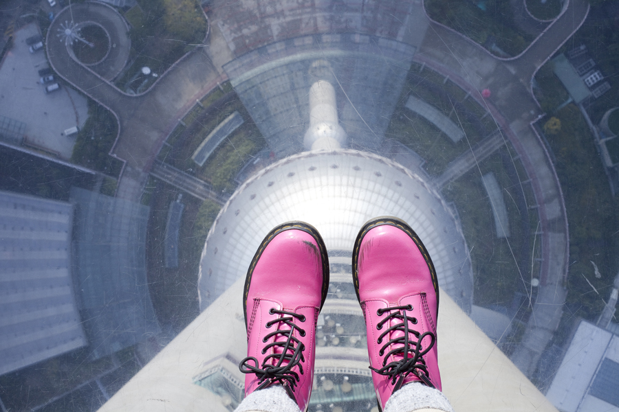 Standing on the glass floor of the Oriental Pearl tower, Shanghai.