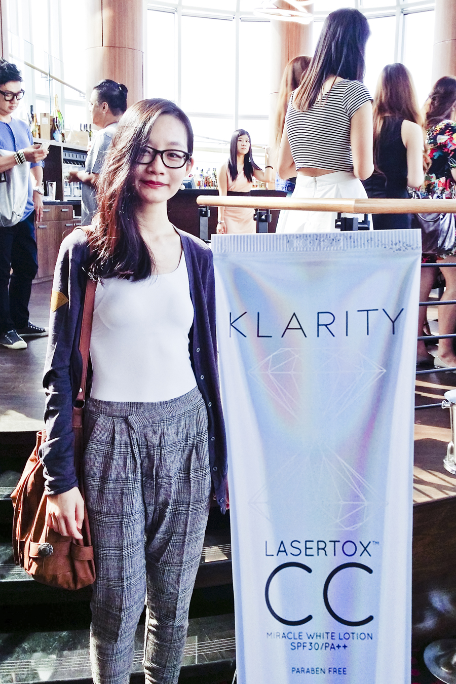 Ren posing with the Klarity CC cream cut-out at the Klarity Beauty Brunch event.