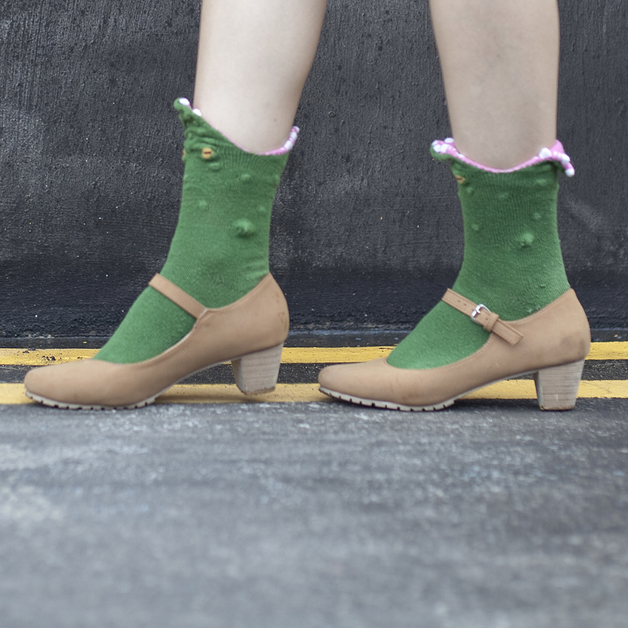 Green crocodile socks from The Sock Market, brown mary jane heels from Mixit.