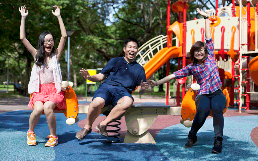 Animated gif of Ren, Meng, and Jesca on a see-saw.