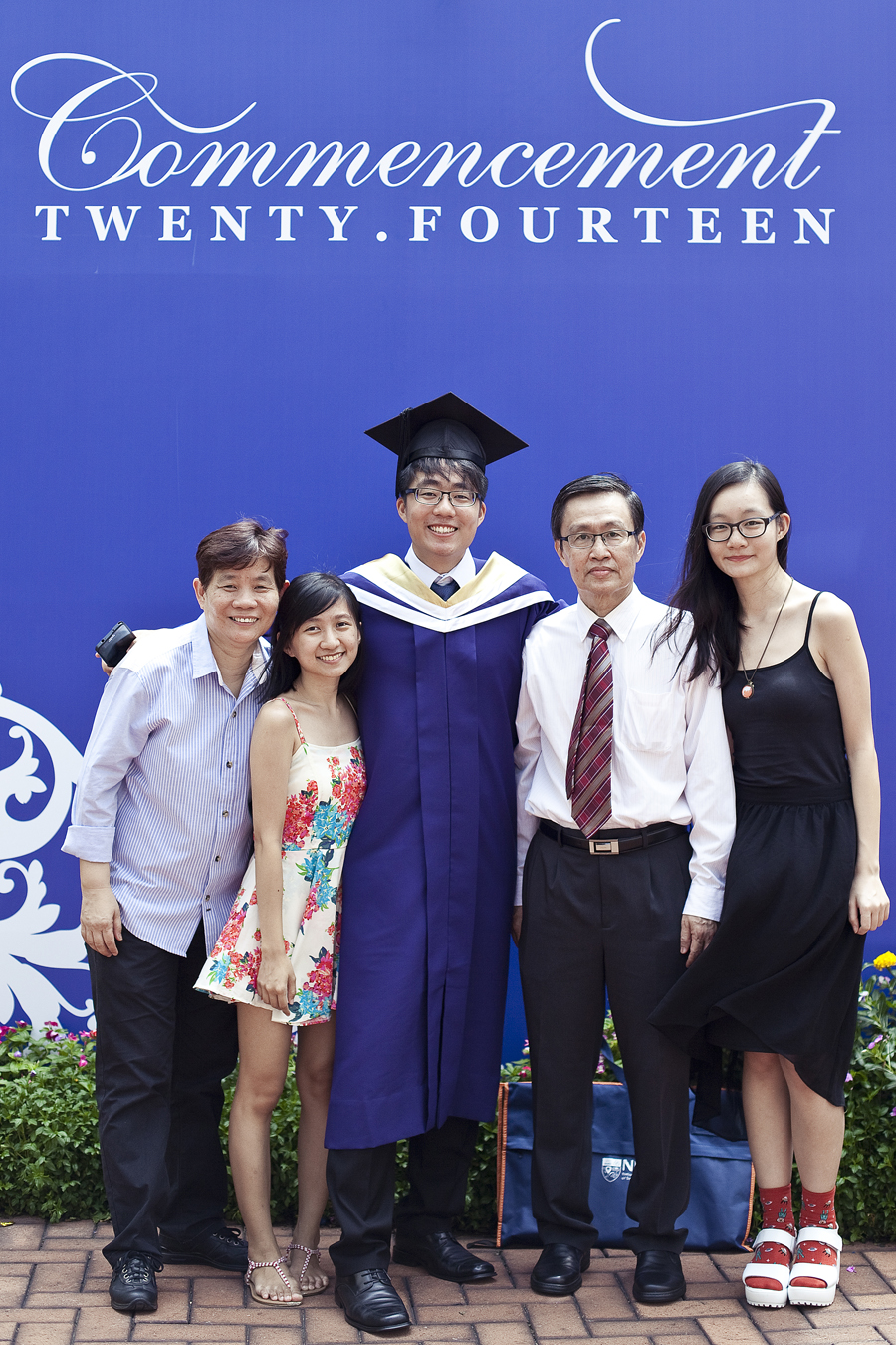 Ren and family at the NUS Commencement 2014.