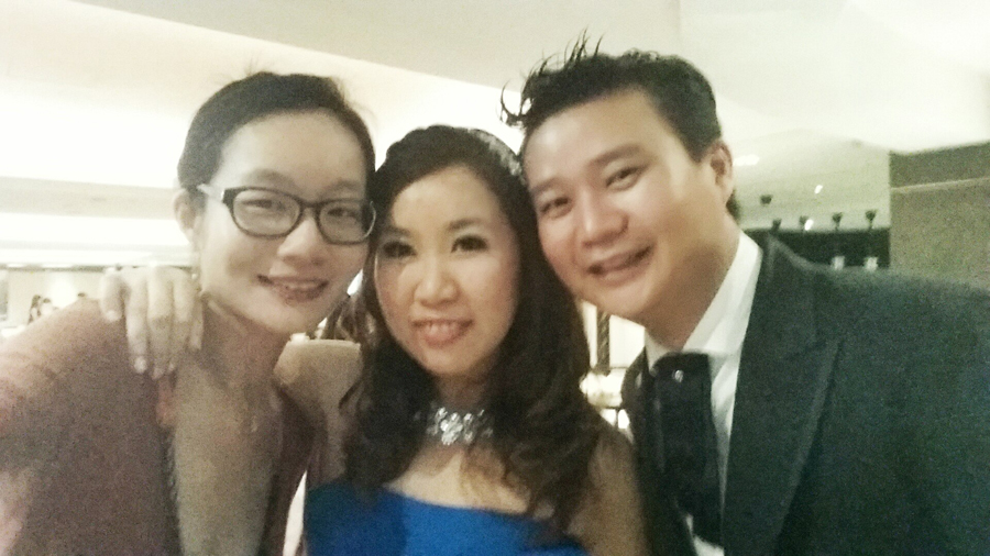 Selfie with bride Ling and groom at their wedding dinner.