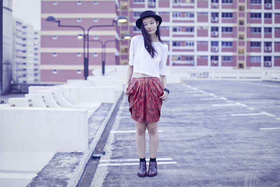 Outfit wearing white textured crop top from Bec & Bridge via Shopbop, Club Marc snakeskin print skirt, Jeffrey Campbell cutout booties in wine via Shopbop, black felt hat from Taobao, black socks from Taobao, canvas pouch from Innisfree.