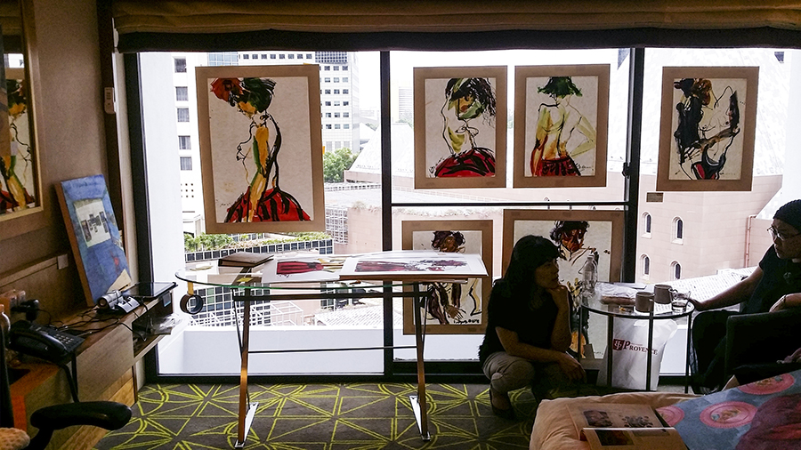 Drawings and paintings on display at the Pan Pacific Hotel room for the Bank Art Fair 2014 in Singapore.
