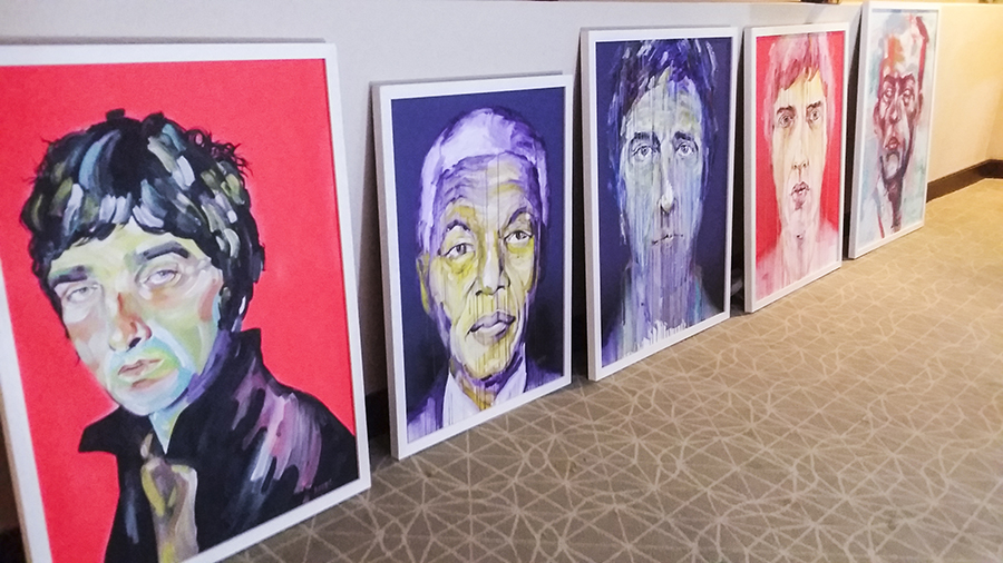 Painted portraits at the Bank Art Fair 2014 in Singapore.