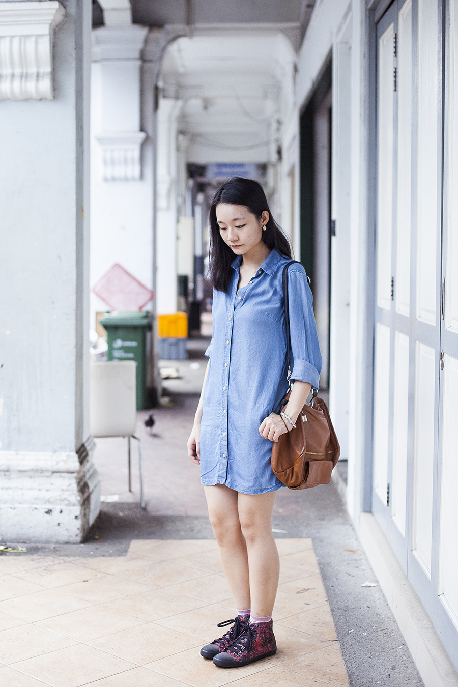 Outfit details: Uniqlo denim long-sleeved dress, Accessorize striped socks, Puma McQ Rush high top sneakers c/o Shopbop, gold flower earrings, chinese bead bracelet.