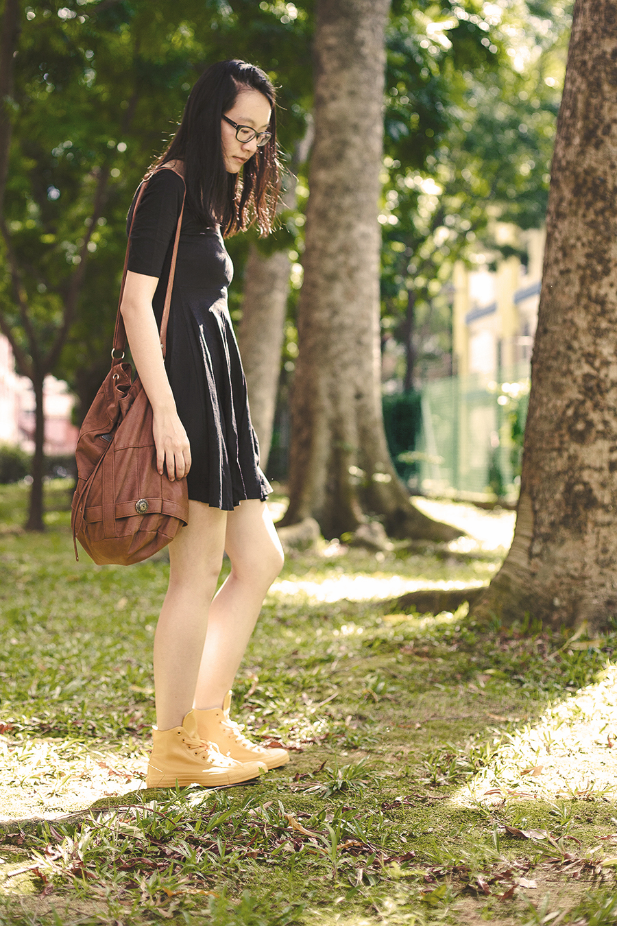 Summer outfit details: Forever 21 little black scoop back dress, Gentle Fawn brown leather sling bag, Converse All star Chuck Taylor yellow Rubber Coated Sneakers, Gap black frame glasses.