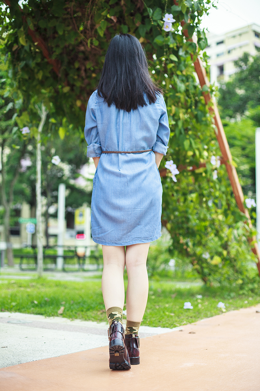 Back view: Uniqlo denim long-sleeved dress, brown braid thin belt, Gap black frame glasses, Stance green camouflage socks, Jeffrey Campbell Flamel cutout booties in wine.