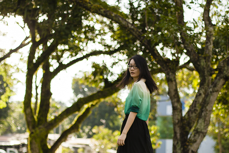 Gradient green chiffon shirt from Romwe, black chiffon skirt from Forever 21, black frame glasses from Gap, red high top sneakers from Puma x McQ via Shopbop, red matryoshka earrings.