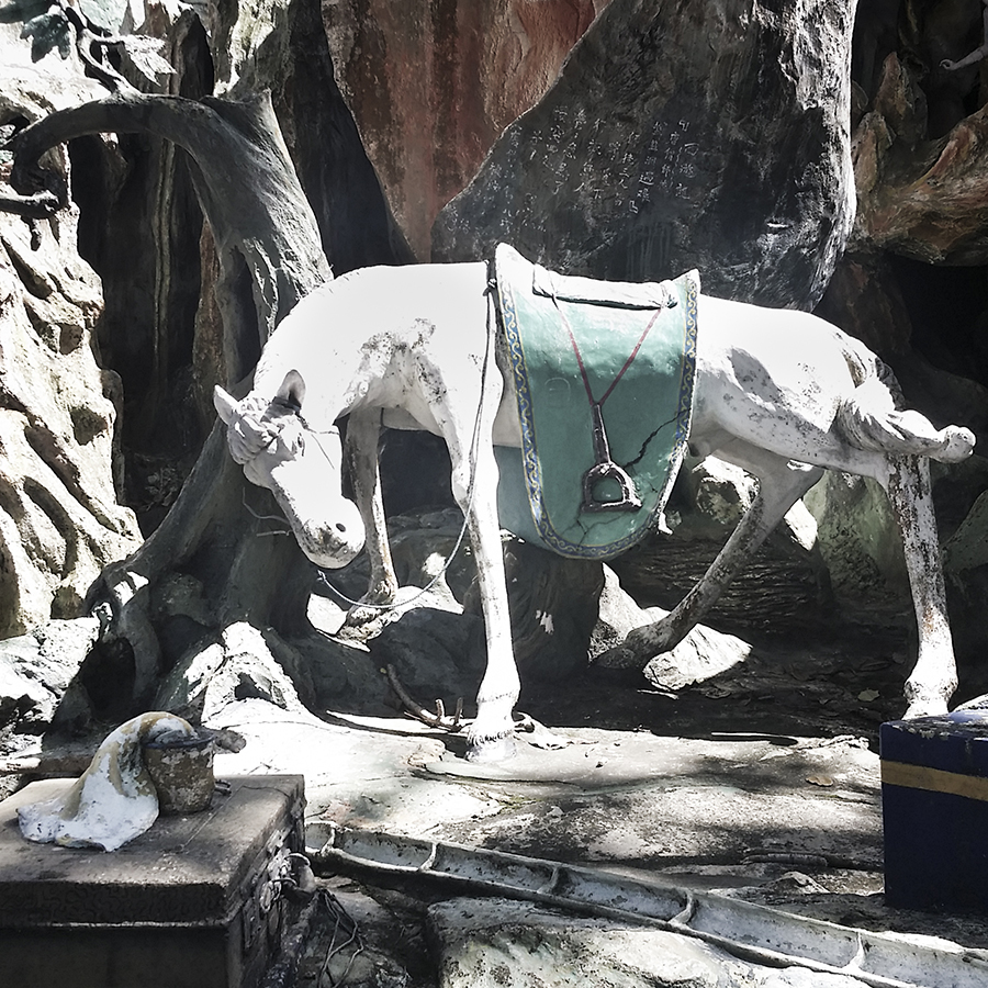 Statue of Tripitaka's magical white horse from the tale of Journey to the West at Haw Par Villa, Singapore.