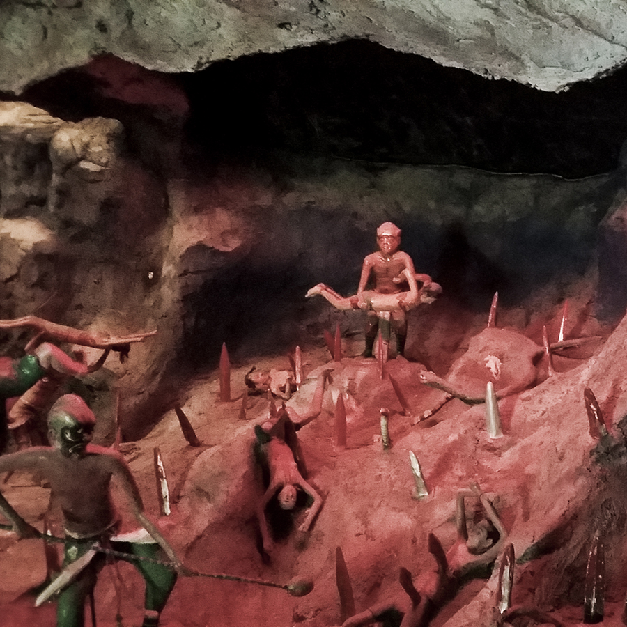 The dead thrown onto a hill of knives at the Ten Courts of Hell (åå…«æ™¨åœ°ç‹±) at Haw Par Villa, Singapore.