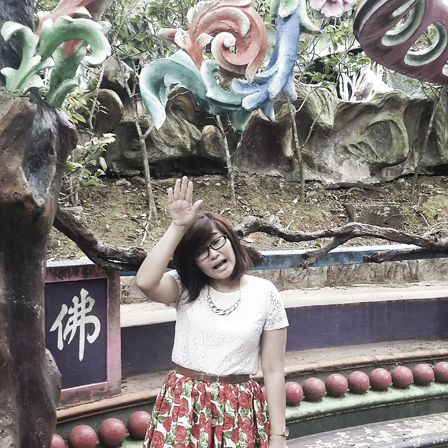 Jesca and her outfit at Haw Par Villa, Singapore