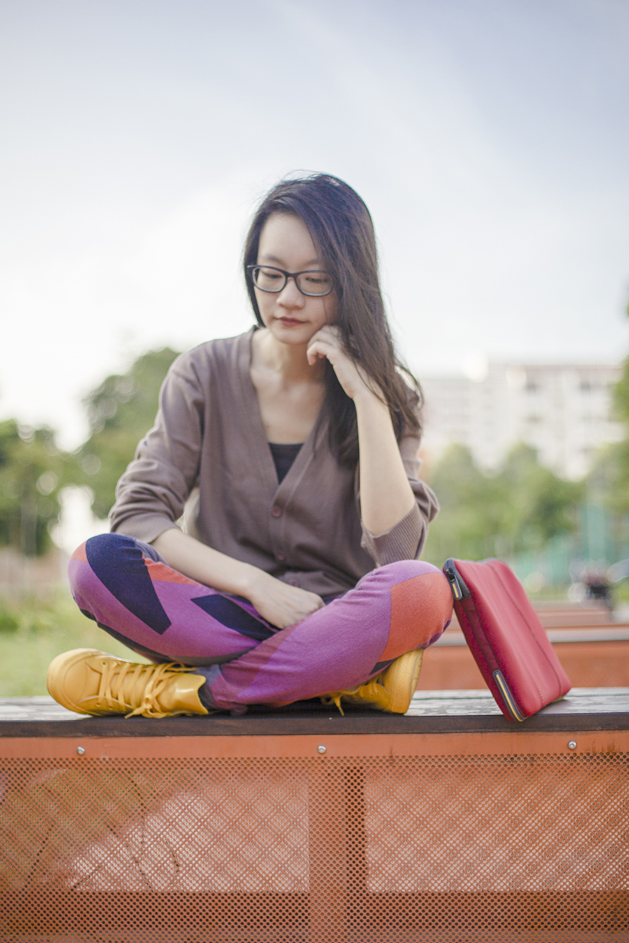 Gap black frame glasses, Targus red laptop sleeve, Uniqlo black bratop camisole, Staples dust boyfriend cardigan, BDG abstract purple jeans from Urban Outfitters, Converse yellow rubber-coated All Stars Chuck Taylors sneakers c/o Shopbop.